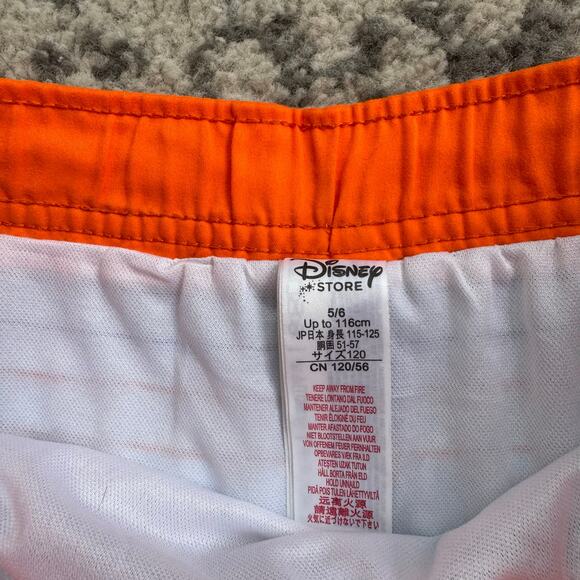 DISNEY STORE MILES FROM TOMORROWLAND SWIM TRUNKS Size 5/6 - Picture 4 of 6
